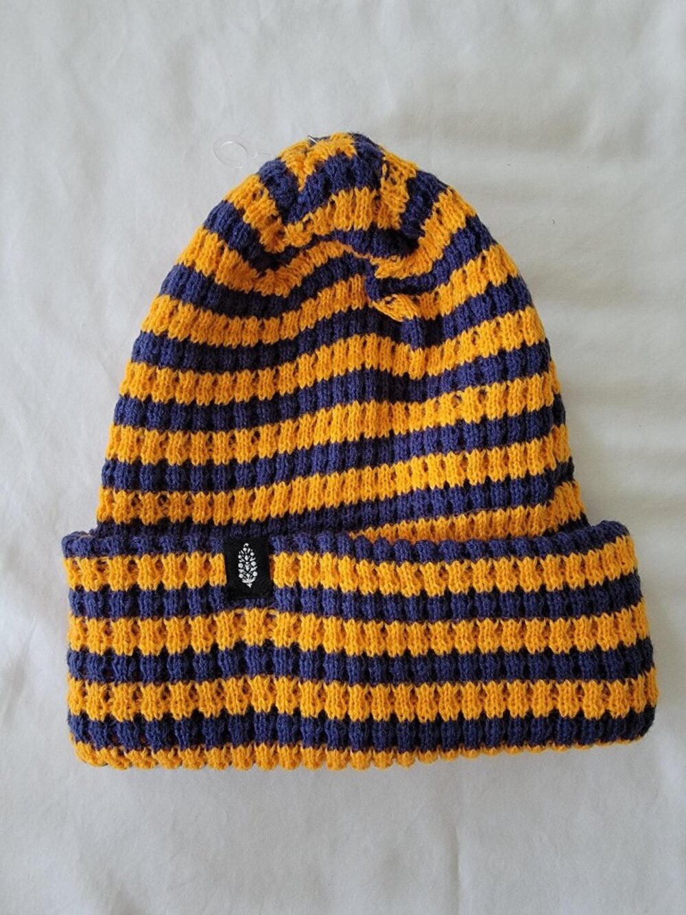 NWT Free people movement | Stripe It Up Cool Down Beanie - Varsity Orange